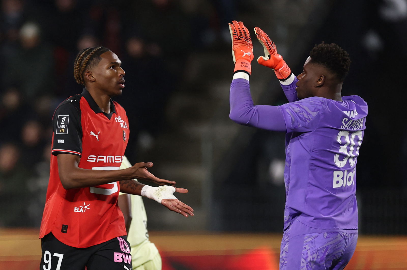 Stade Rennes' Jeremy Jacquet reacts with Brice Samba. (REUTERS/Stephane Mahe)