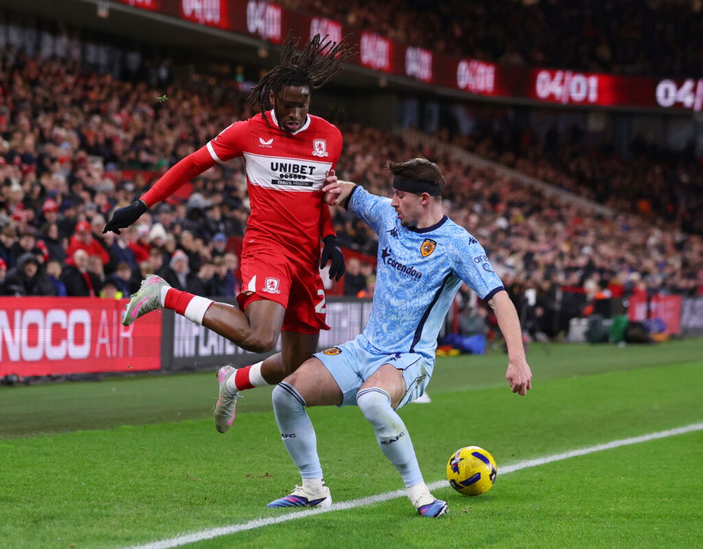 Middlesbrough's Mamadou Kaly Sene in action with Hull City's Charlie Hughes. (Action Images/Ed Sykes)