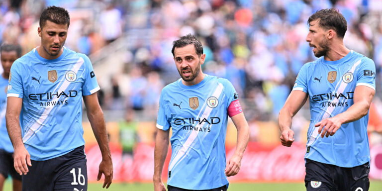 Rodri; Bernardo Silva and Ruben Dias. (Luciano Bisbal/Getty Images)