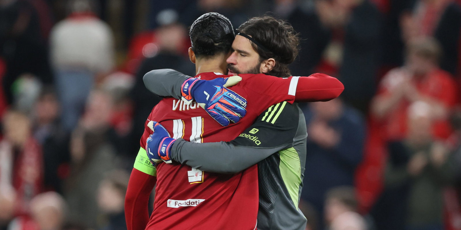 Virgil van Dijk and Alisson Becker. (Richard Sellers/Sportsphoto/Allstar via Getty Images)
